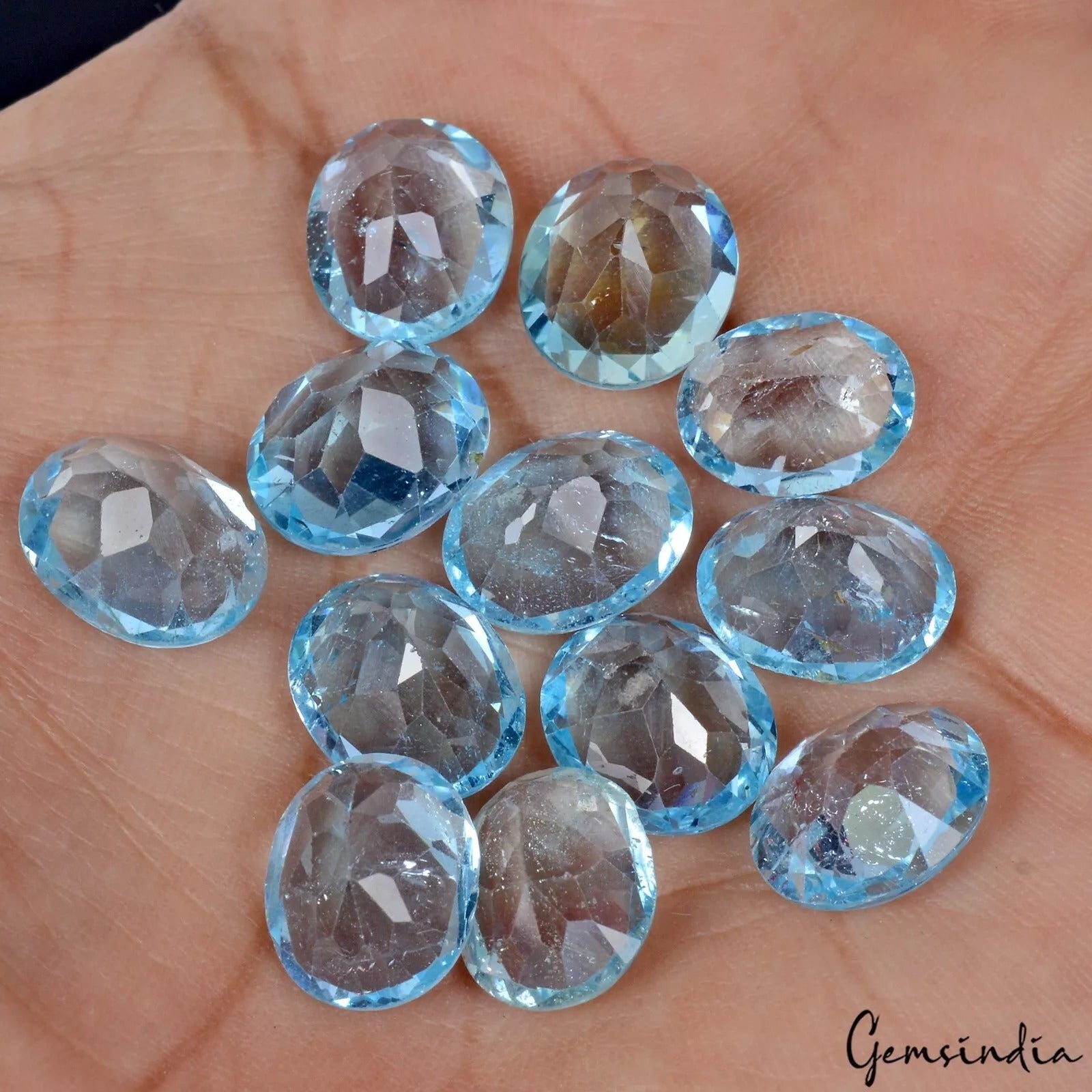 Blue Topaz Lot, Loose Gemstone, Oval faceted Cut, Untreated — 12 Pieces, 11mm to 12mm, 66.00 Ct