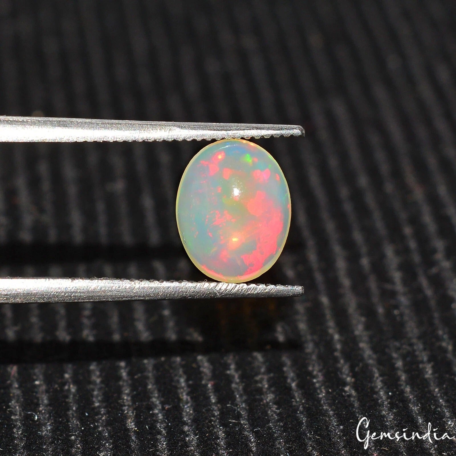 Opal Cabochon, Untreated, Multi Color — 9x7x3mm, 1.20 Ct, Ethiopia