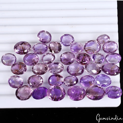 Amethyst Lot, Loose Gemstone, Oval Cut, Purple — 34 Pieces, 10mm to 15mm, 225.50 Ct, Uruguay