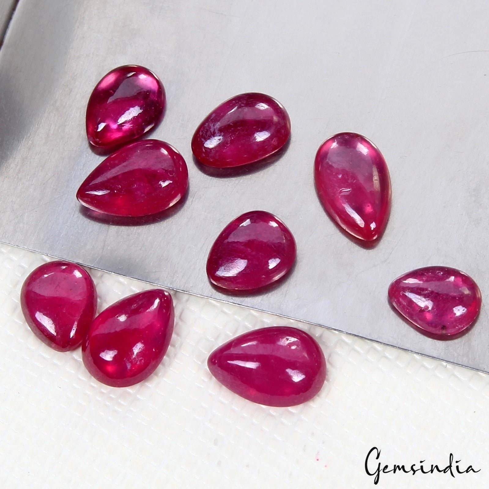 Ruby Loose Gemstone, Pear cabochon Number Of Stone : 9, Heated — 6mm, 8.50 Ct, Mozambique