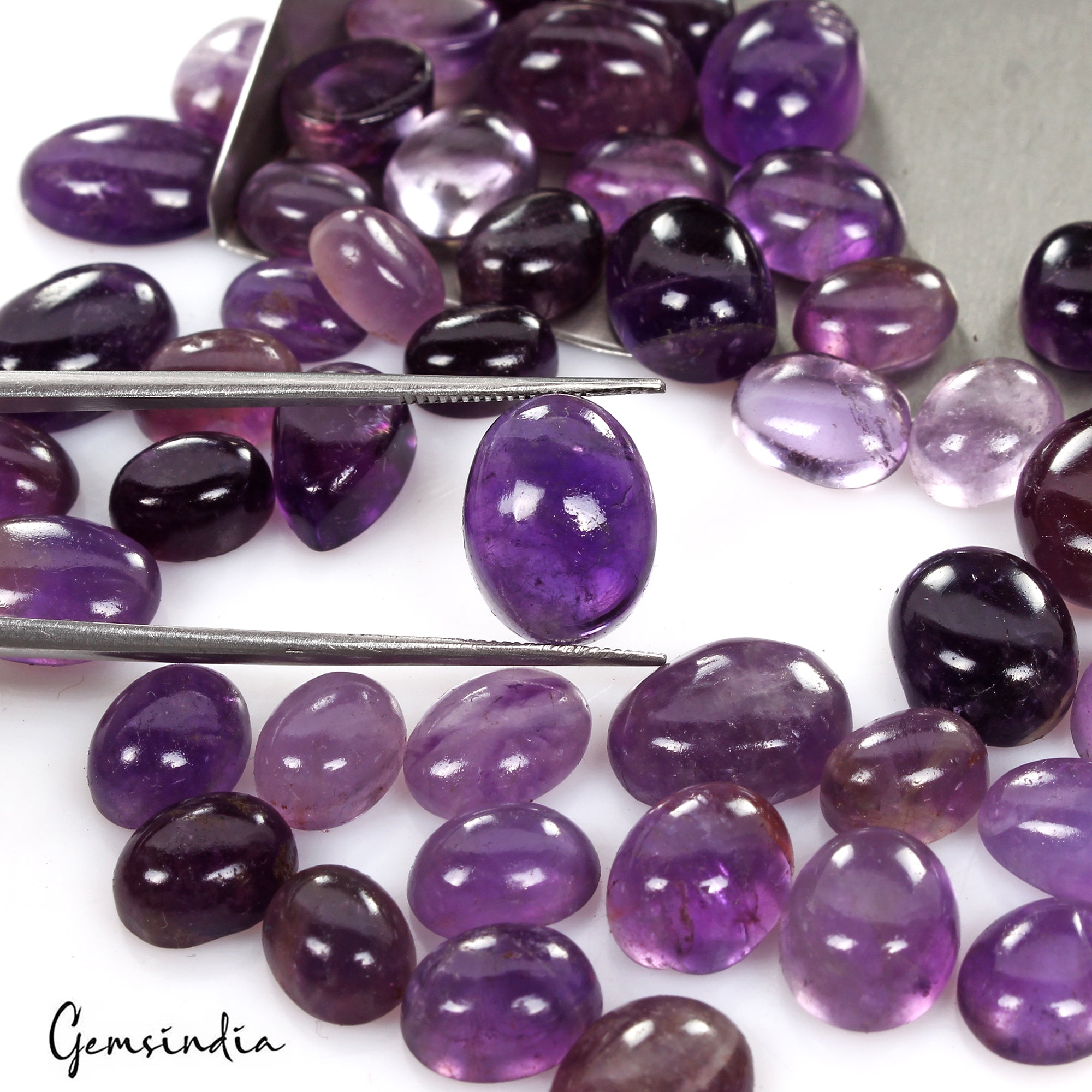 Amethyst Lot, Cabochon, Oval Cabochon, Untreated — 55 Pieces, 9mm to 14mm, 212.40 Ct, Brazil