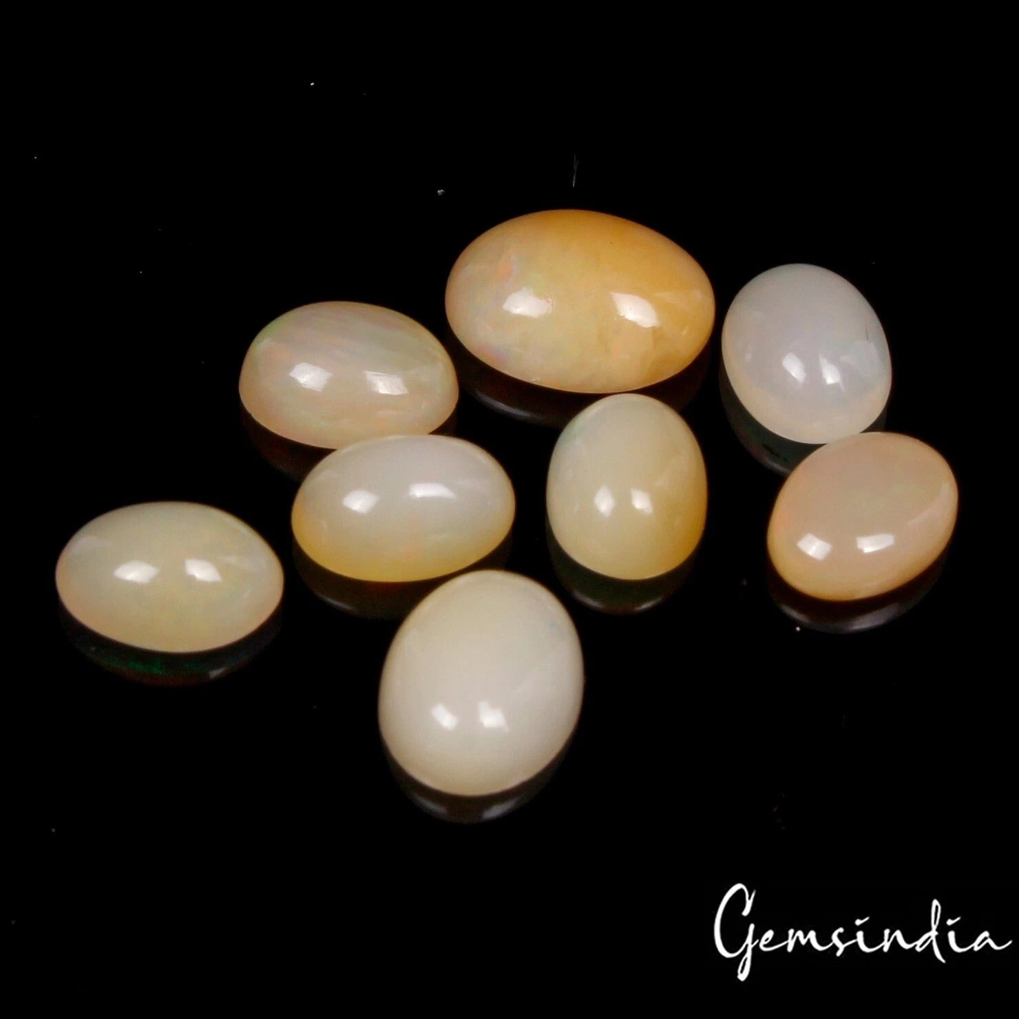 7.50 Cts Lot of Ethiopian Opal Untreated Oval Cabochons in Gem Jar 8-10mm/8 Pcs