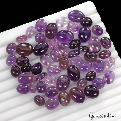 Amethyst Lot, Cabochon, Oval Cabochon, Untreated — 55 Pieces, 9mm to 14mm, 212.40 Ct, Brazil