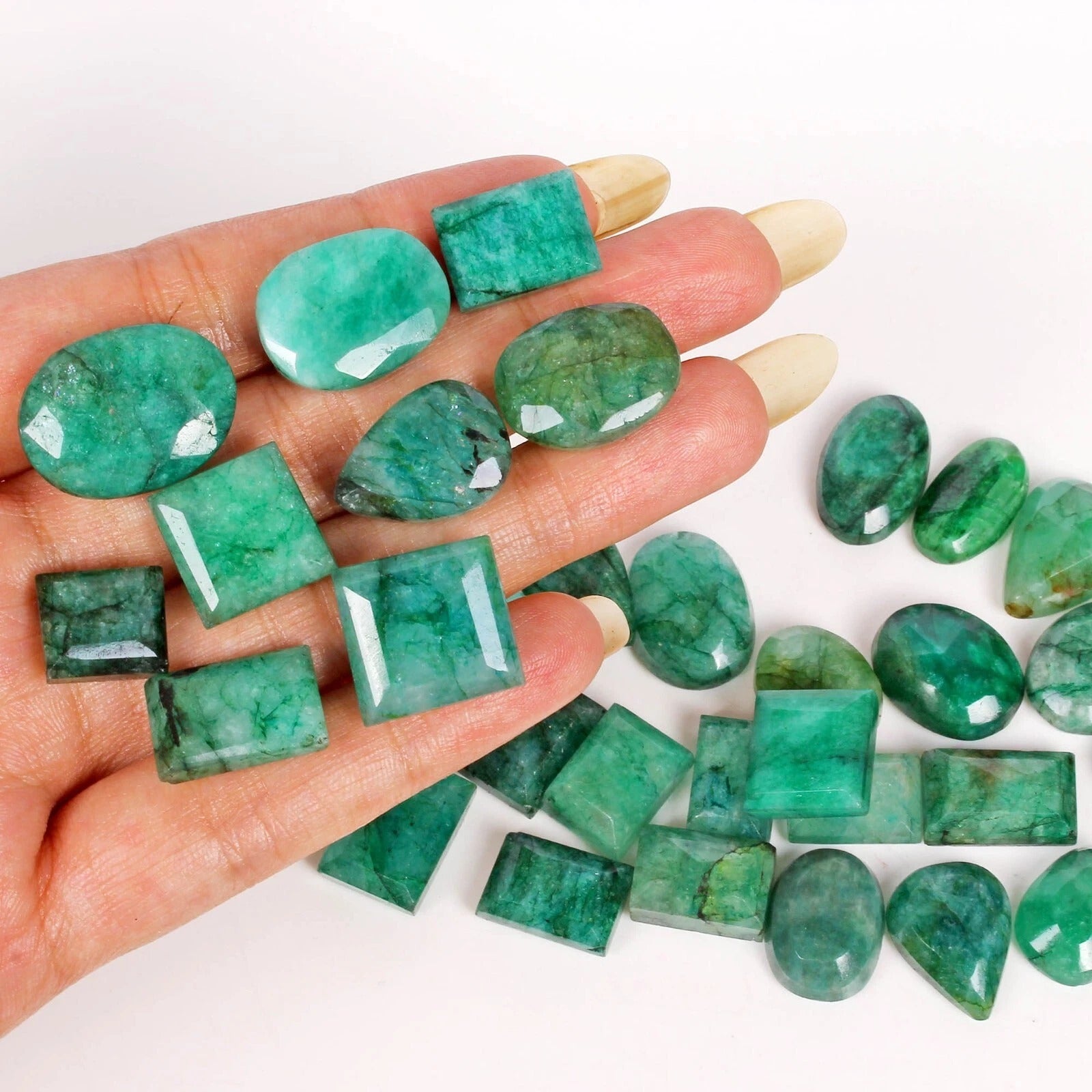Emerald Lot, Loose Gemstone, Rectangular Faceted Cut, Color Enhanced — 34 Pieces, 12mm to 22mm, 500 Ct, Brazil