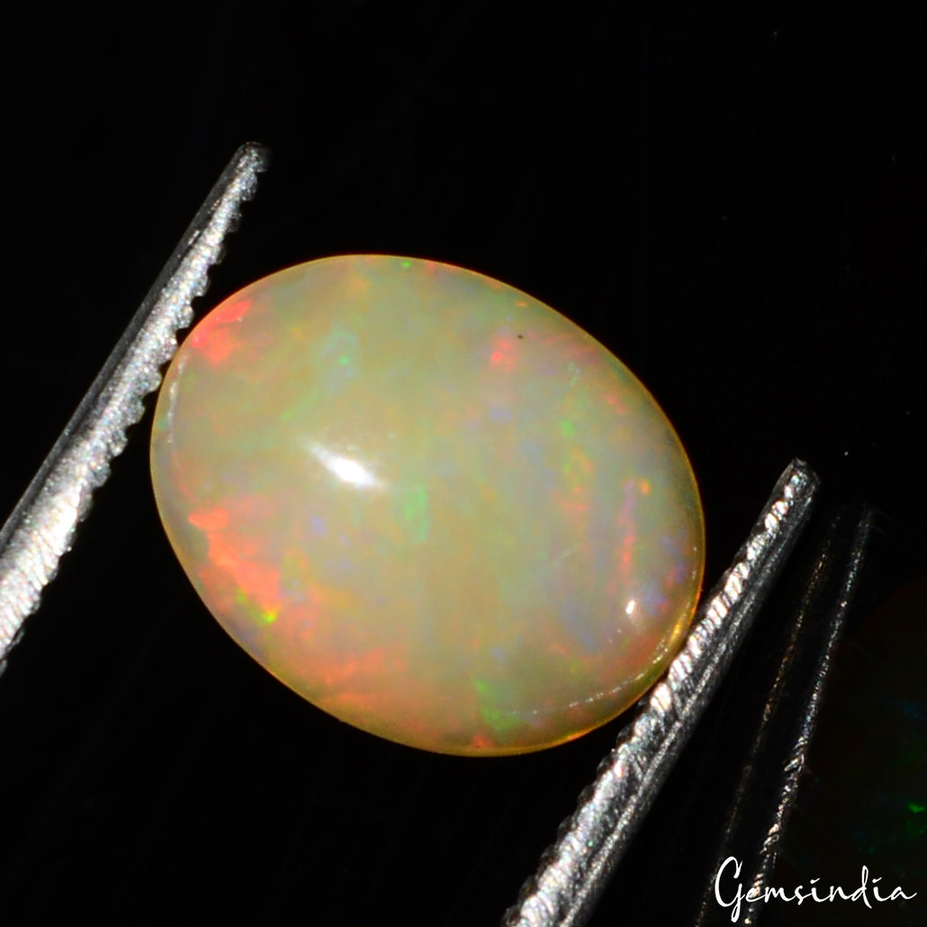 Opal Loose Gemstone, Oval Cabochon, Untreated — 10x8x3mm, 1.20 Ct, Ethiopia