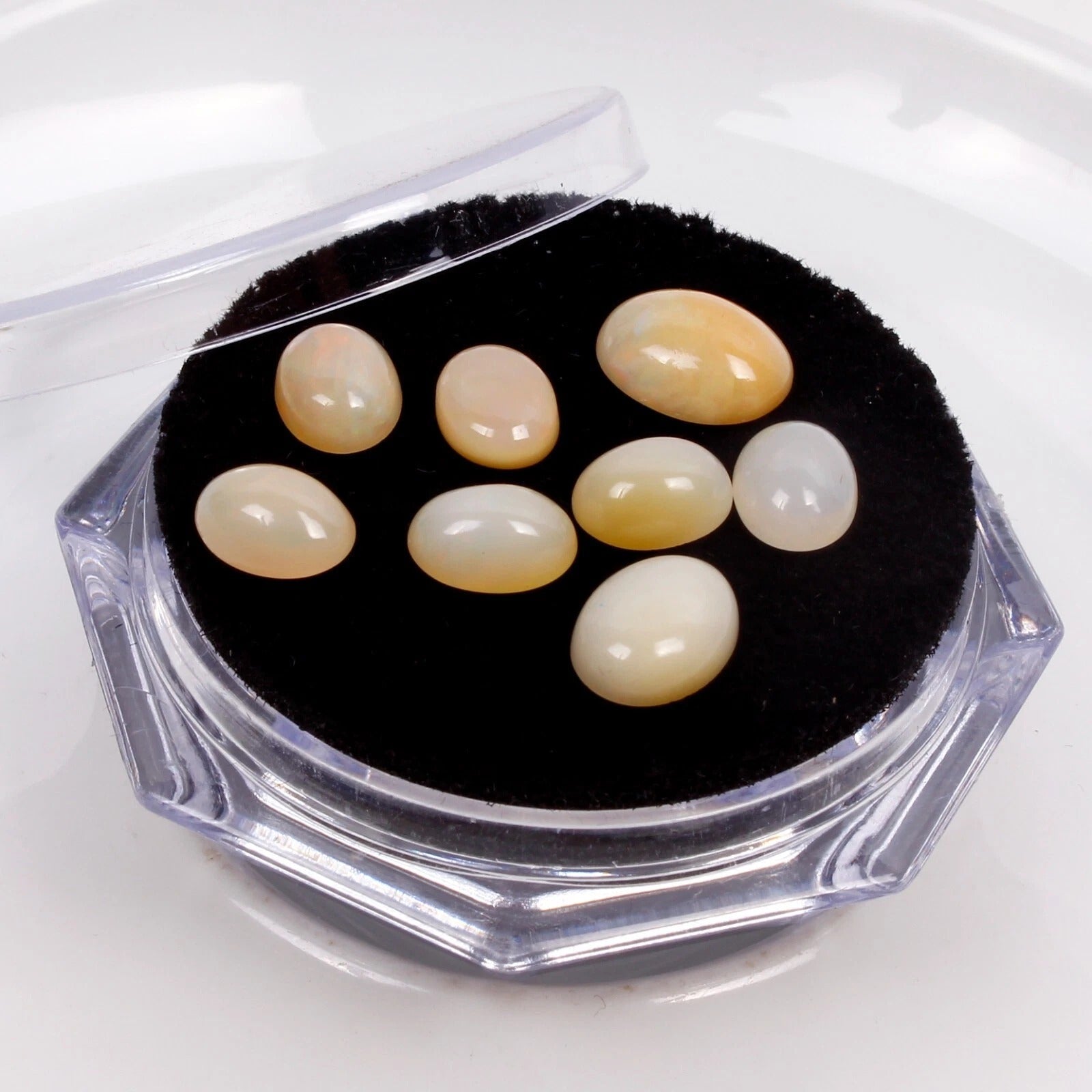 7.50 Cts Lot of Ethiopian Opal Untreated Oval Cabochons in Gem Jar 8-10mm/8 Pcs