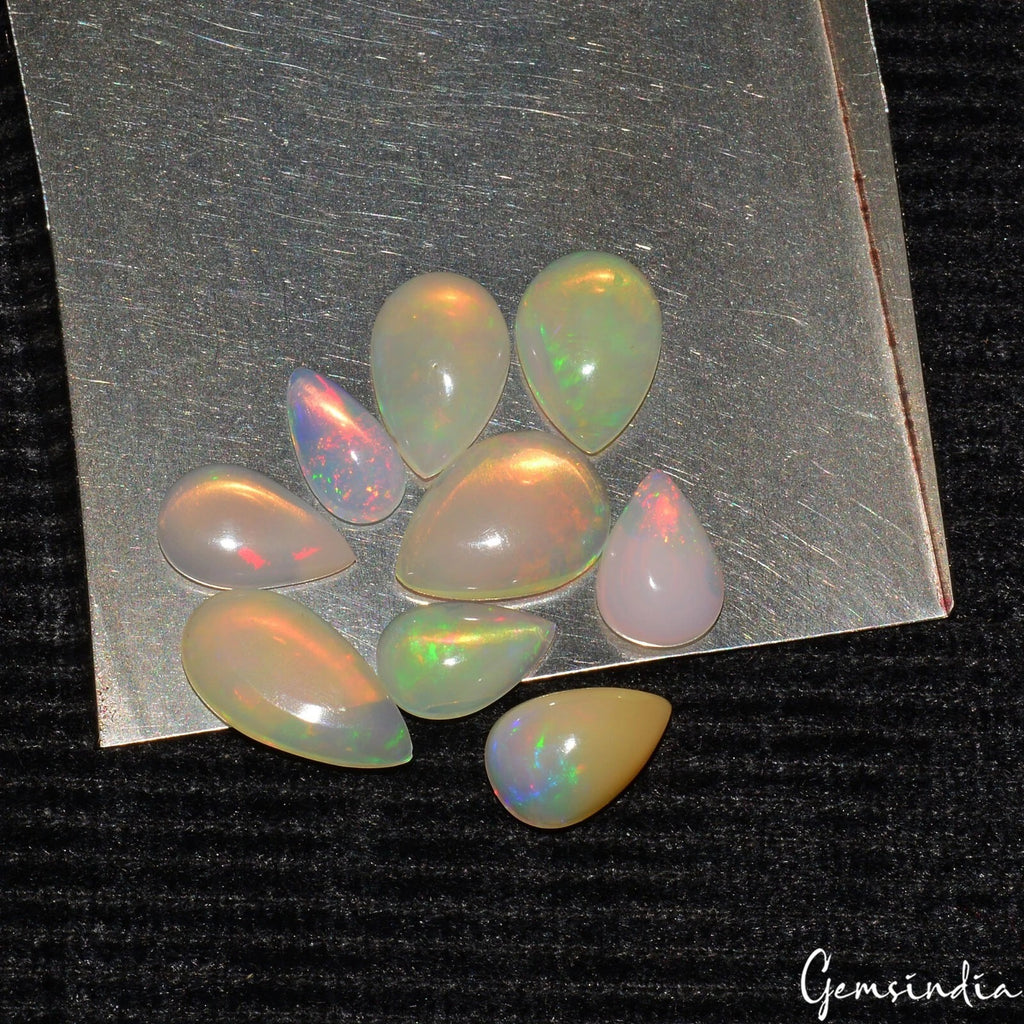 Ethiopian Opal Lot, Cabochon, Pear Cabochon, Rainbow — 9 Pieces, 7mm to 12mm, 7.45 Ct, Ethiopia