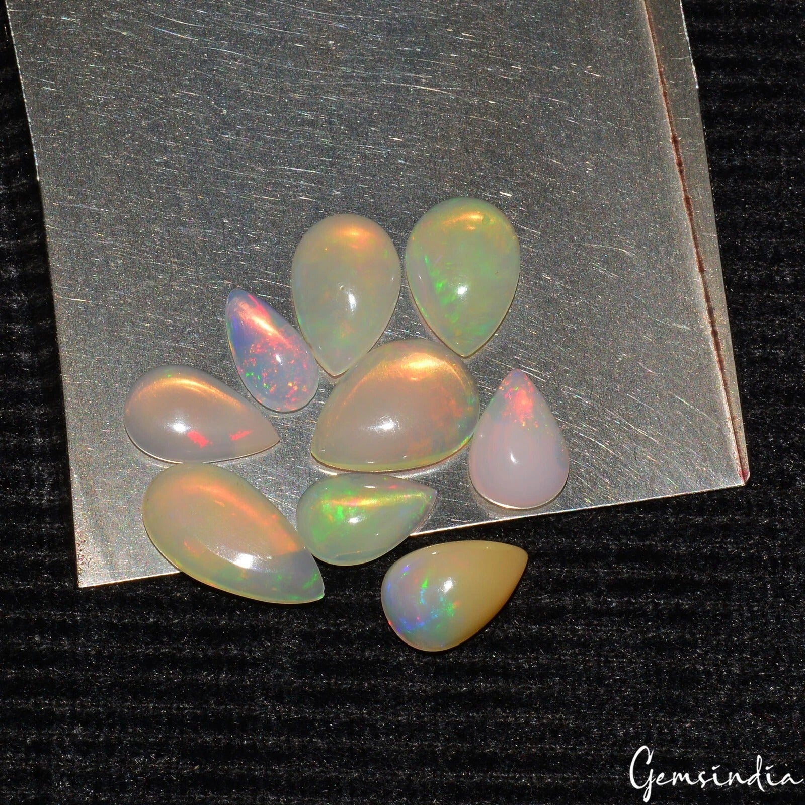 Ethiopian Opal Lot, Cabochon, Pear Cabochon, Rainbow — 9 Pieces, 7mm to 12mm, 7.45 Ct, Ethiopia