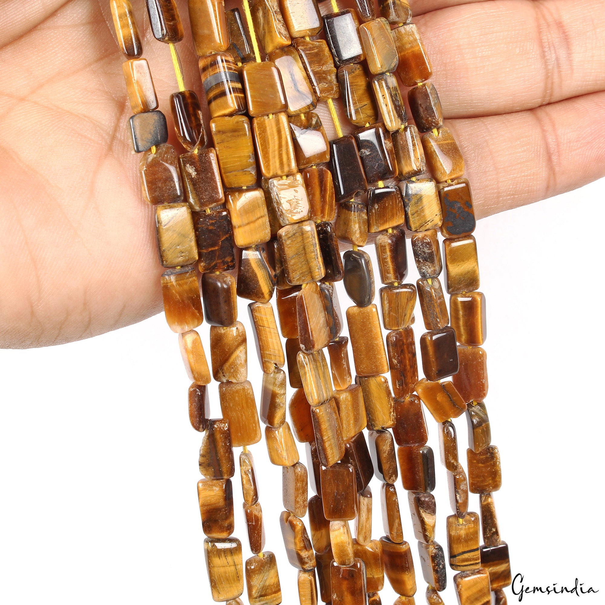Tiger Eye Beaded Strand, Untreated — 7mm to 10mm, 590 Ct