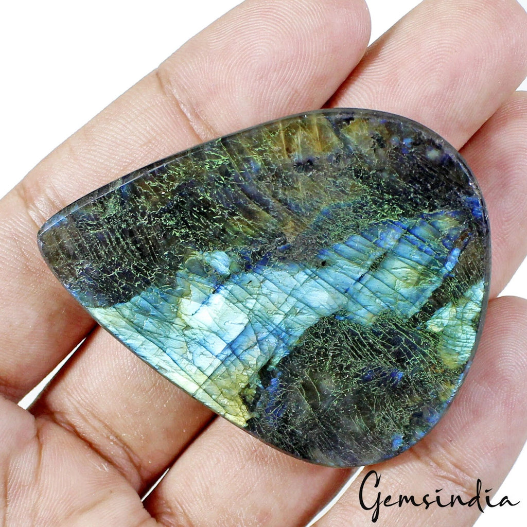Spectrolite Cabochon, Untreated — 59x47x9 mm, 205.80 Ct