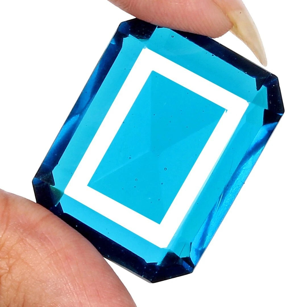 Blue Topaz Loose Gemstone — 32 x 25 x 15mm, 98.00 Ct