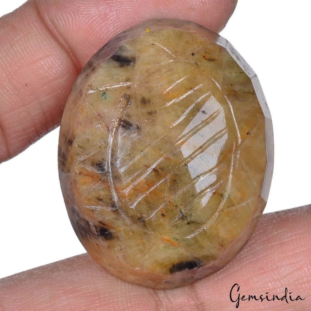 Sapphire Carving, Untreated, Brown — 38x31x15 mm, 188.20 Ct