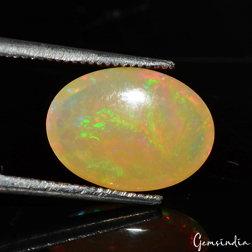 Opal Loose Gemstone, Oval Cabochon, Untreated — 12x9x4mm, 2.00 Ct, Ethiopia