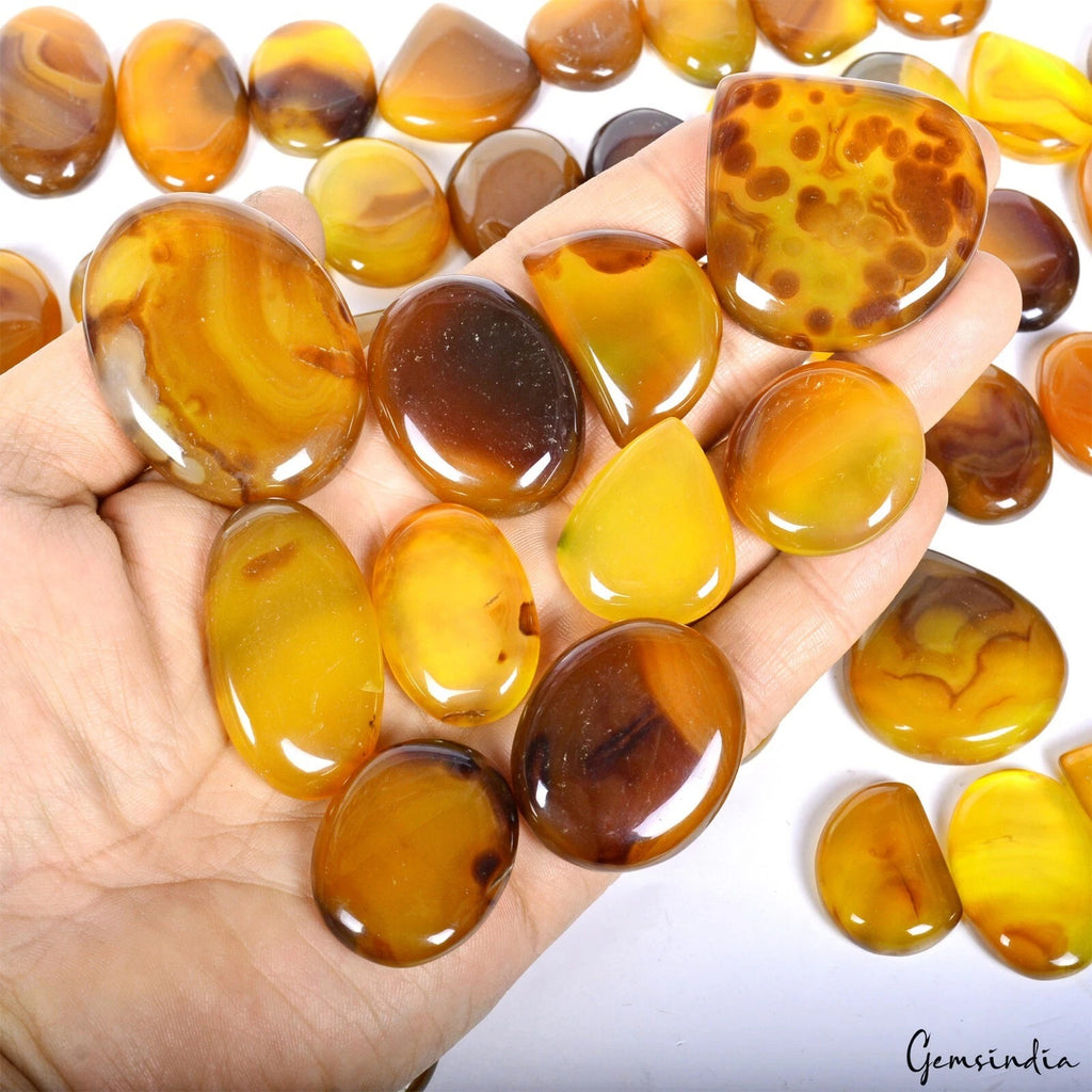 Onyx Lot, Cabochon, Yellow — 70 Pieces, 25mm to 46mm, 3500 Ct
